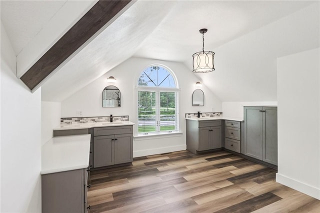 3442 Mercer Rd, Neshannock Twp, PA 16105 - full bathroom featuring vaulted ceiling, two vanities, and wood finished floors