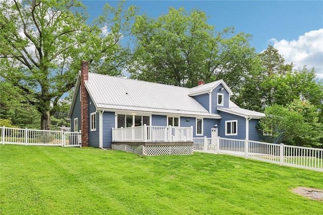 3442 Mercer Rd, Neshannock Twp, PA 16105 - view of front of house featuring a chimney, a wooden deck, a fenced backyard, and a metal roof