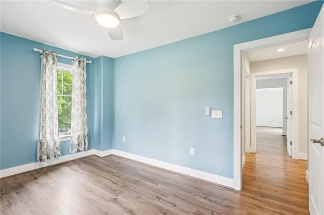 3442 Mercer Rd, Neshannock Twp, PA 16105 - spare room featuring a smoke detector, wood finished floors, and a ceiling fan