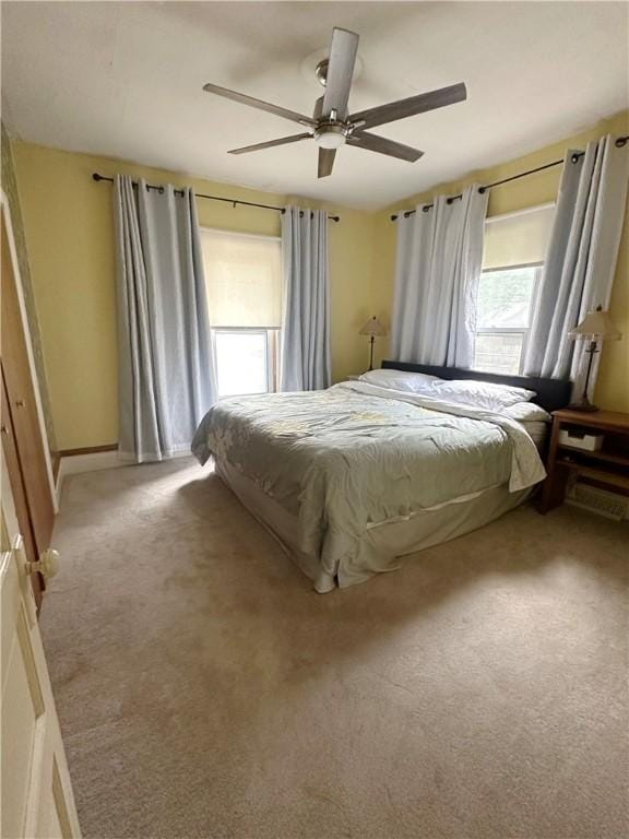 566 4th St, City Of But Ne, PA 16001 - bedroom featuring light carpet and a ceiling fan