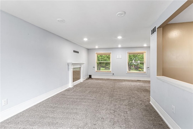 747 Thornwick Dr, Upper St Clair, PA 15243 - unfurnished room featuring recessed lighting, carpet floors, and a fireplace