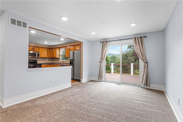 747 Thornwick Dr, Upper St Clair, PA 15243 - unfurnished living room featuring light carpet and recessed lighting