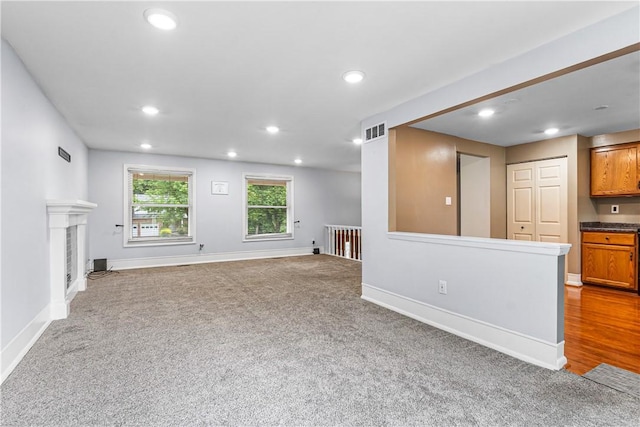 747 Thornwick Dr, Upper St Clair, PA 15243 - unfurnished living room with recessed lighting, carpet flooring, and a fireplace