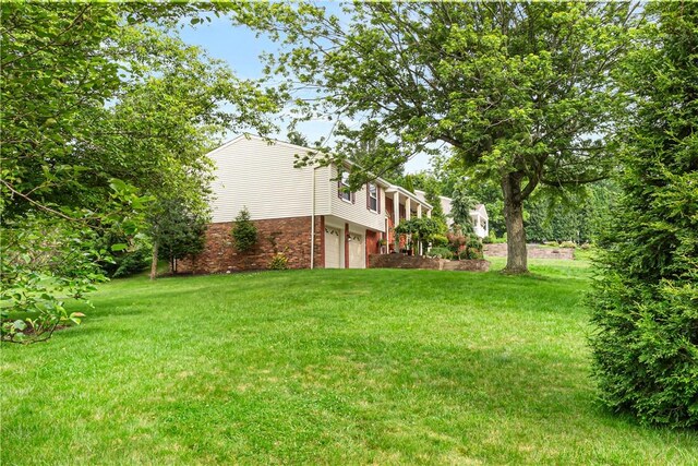 747 Thornwick Dr, Upper St Clair, PA 15243 - view of grassy yard with an attached garage