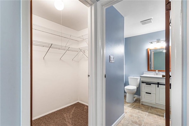 747 Thornwick Dr, Upper St Clair, PA 15243 - bathroom with vanity and a walk in closet