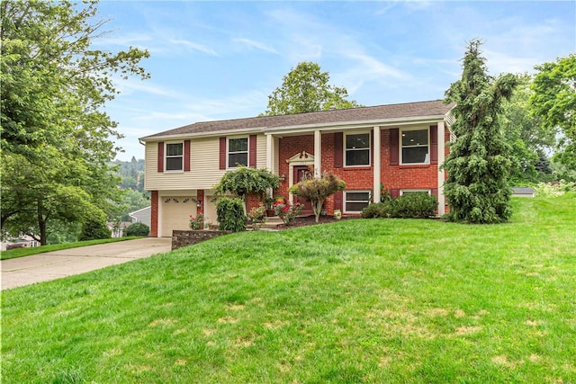 747 Thornwick Dr, Upper St Clair, PA 15243 - bi-level home with driveway, a garage, a front yard, and brick siding