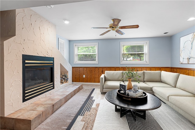 747 Thornwick Dr, Upper St Clair, PA 15243 - living room with wainscoting, a ceiling fan, a tile fireplace, wooden walls, and recessed lighting