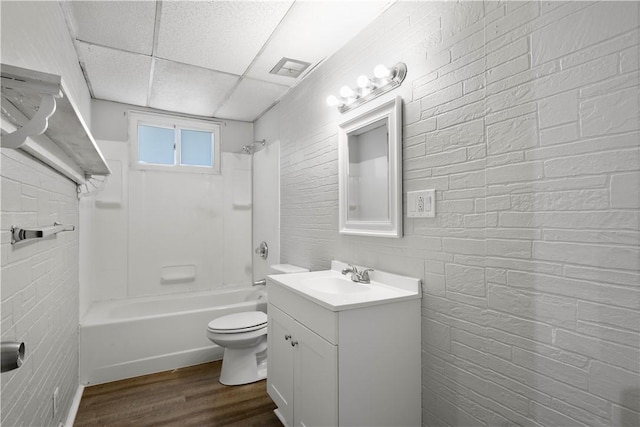 10 Fieldcrest Dr, Robinson Twp Wsh, PA 15057 - bathroom with vanity, shower / bath combination, wood finished floors, and a drop ceiling