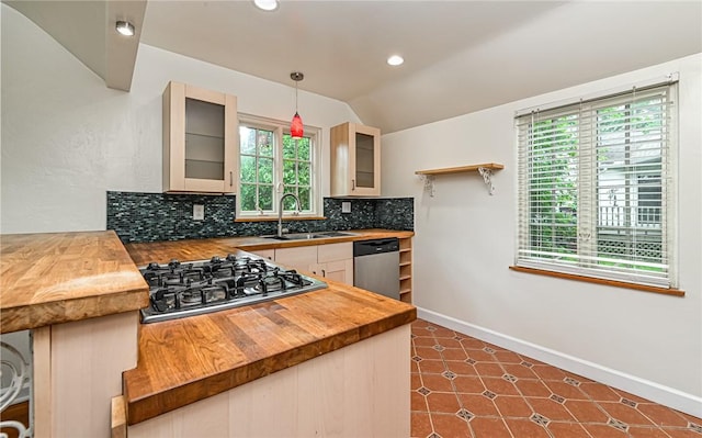 300 S Pasadena Dr, Fox Chapel, PA 15215 - kitchen with butcher block countertops, appliances with stainless steel finishes, plenty of natural light, lofted ceiling, and recessed lighting