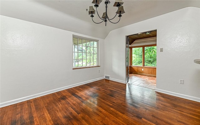 300 S Pasadena Dr, Fox Chapel, PA 15215 - unfurnished room featuring plenty of natural light, a chandelier, wood-type flooring, and vaulted ceiling