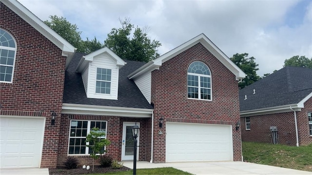 149 Shady River Blvd Unit 40B, Economy, PA 15005 - traditional home featuring brick siding, a garage, concrete driveway, and a shingled roof