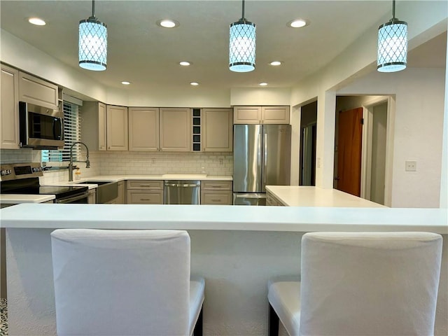 622 Fuhrman Ln, Buffalo Twp But, PA 16229 - kitchen featuring stainless steel appliances, gray cabinets, backsplash, light countertops, and recessed lighting