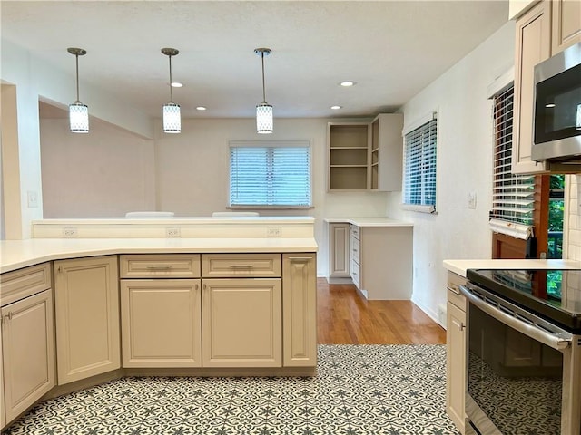 622 Fuhrman Ln, Buffalo Twp But, PA 16229 - kitchen with stainless steel appliances, open shelves, light countertops, pendant lighting, and recessed lighting