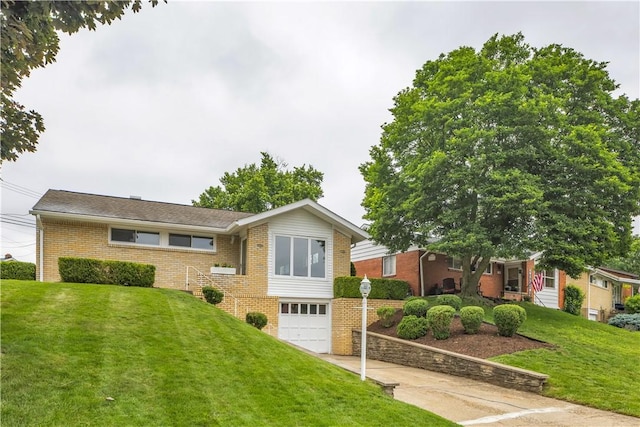 354 Ryan Dr, Pittsburgh, PA 15220 - view of front of home featuring concrete driveway, brick siding, an attached garage, and a front lawn