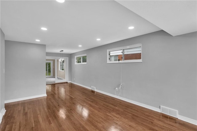 354 Ryan Dr, Pittsburgh, PA 15220 - unfurnished living room with wood finished floors and recessed lighting
