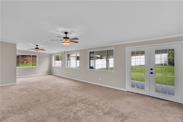 354 Ryan Dr, Pittsburgh, PA 15220 - carpeted spare room with crown molding, french doors, and a ceiling fan