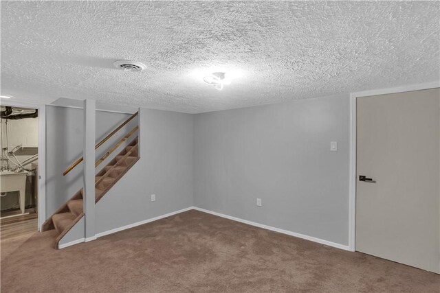 354 Ryan Dr, Pittsburgh, PA 15220 - finished below grade area with carpet flooring, stairway, and a textured ceiling