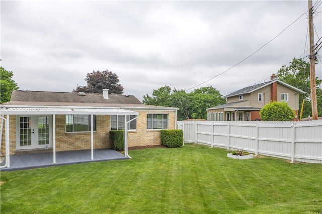 354 Ryan Dr, Pittsburgh, PA 15220 - rear view of property with a patio area, brick siding, and french doors