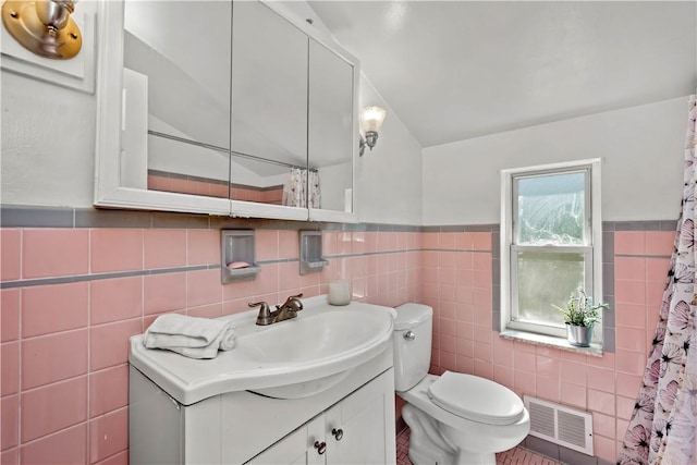 1492 Prospect Rd, Baldwin Boro, PA 15227 - bathroom featuring tile walls, vanity, a shower with shower curtain, and wainscoting