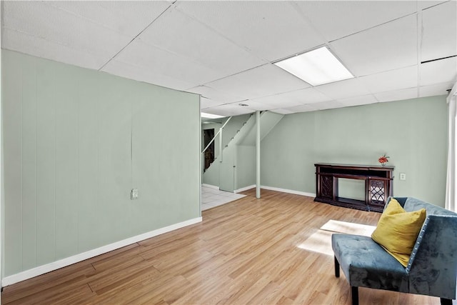 1492 Prospect Rd, Baldwin Boro, PA 15227 - sitting room with wood finished floors, stairway, and a paneled ceiling