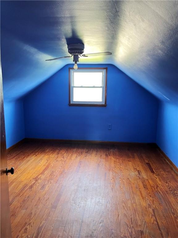 238 Humphrey Rd, Hempfield Twp Wml, PA 15601 - bonus room featuring a ceiling fan, wood finished floors, and vaulted ceiling