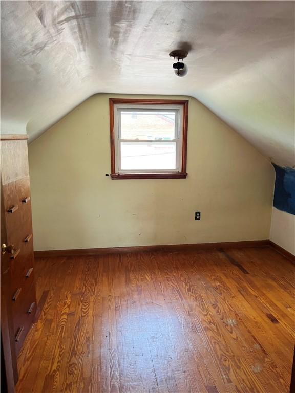 238 Humphrey Rd, Hempfield Twp Wml, PA 15601 - additional living space featuring wood finished floors and lofted ceiling