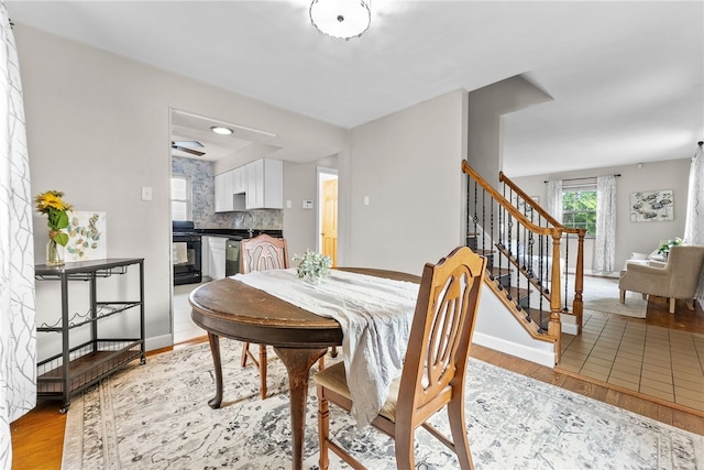 1406 Blossom Hill Rd, Castle Shannon, PA 15234 - dining area featuring light wood-style floors and stairway