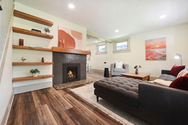 206 Lincoln Ave, Edgewood, PA 15218 - living area featuring wood finished floors, a fireplace, and recessed lighting