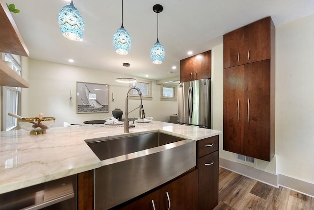 206 Lincoln Ave, Edgewood, PA 15218 - kitchen with freestanding refrigerator, dark wood finished floors, decorative light fixtures, light stone counters, and recessed lighting