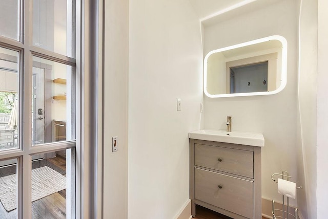 206 Lincoln Ave, Edgewood, PA 15218 - bathroom featuring vanity and wood finished floors