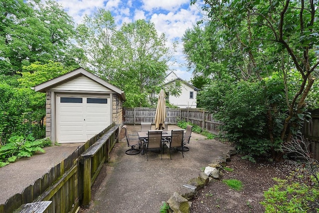 206 Lincoln Ave, Edgewood, PA 15218 - fenced backyard featuring an outbuilding, outdoor dining space, and a patio