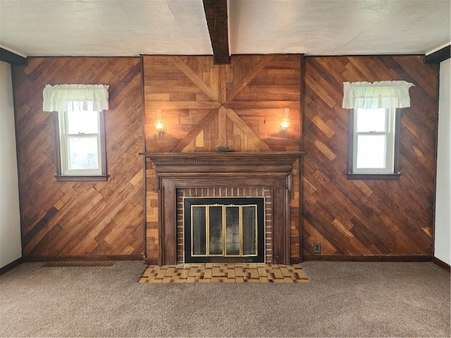 1025 Union Ave, Brackenridge, PA 15014 - detailed view of wood walls, a brick fireplace, carpet floors, and beam ceiling