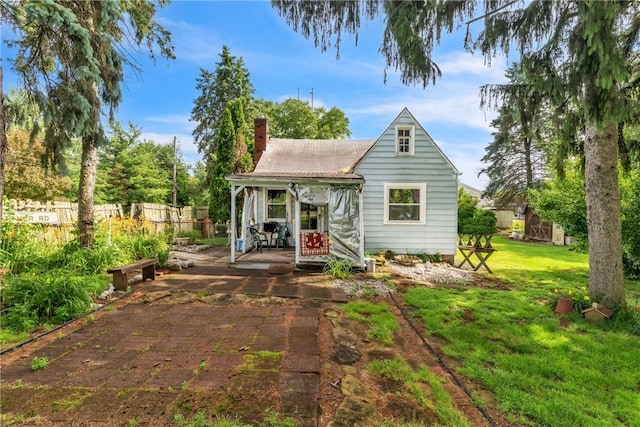 6201 Front River Rd, Neville Twp, PA 15225 - back of house featuring a chimney