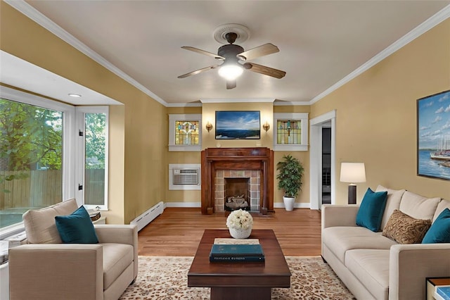5256 Beeler St, Squirrel Hill, PA 15217 - living area with baseboard heating, a tile fireplace, wood finished floors, a wall mounted AC, and a ceiling fan