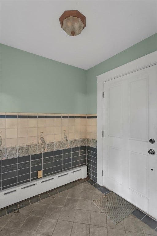 5256 Beeler St, Squirrel Hill, PA 15217 - bathroom featuring baseboard heating, tile patterned floors, and tile walls
