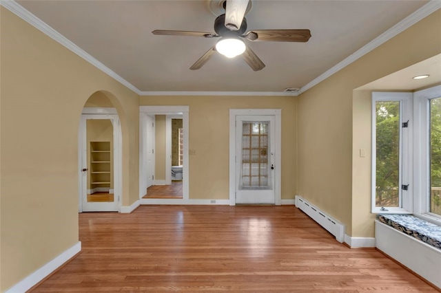 5256 Beeler St, Squirrel Hill, PA 15217 - unfurnished room featuring a baseboard heating unit, light wood-style floors, ornamental molding, ceiling fan, and arched walkways