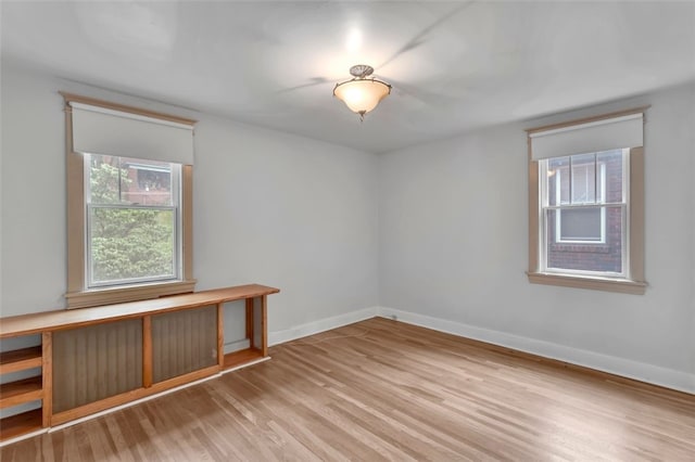 5256 Beeler St, Squirrel Hill, PA 15217 - unfurnished room featuring wood finished floors and baseboards