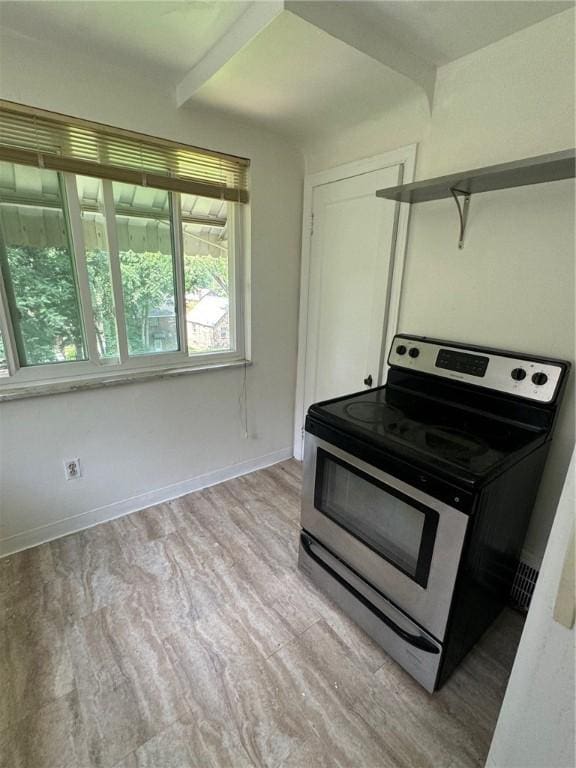 2205 Chalfant St, Chalfant Boro, PA 15221 - kitchen featuring electric stove and light wood-type flooring