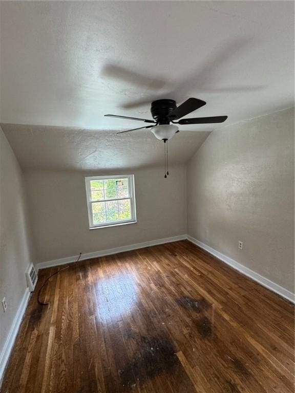 2205 Chalfant St, Chalfant Boro, PA 15221 - empty room featuring hardwood / wood-style flooring, a ceiling fan, and vaulted ceiling