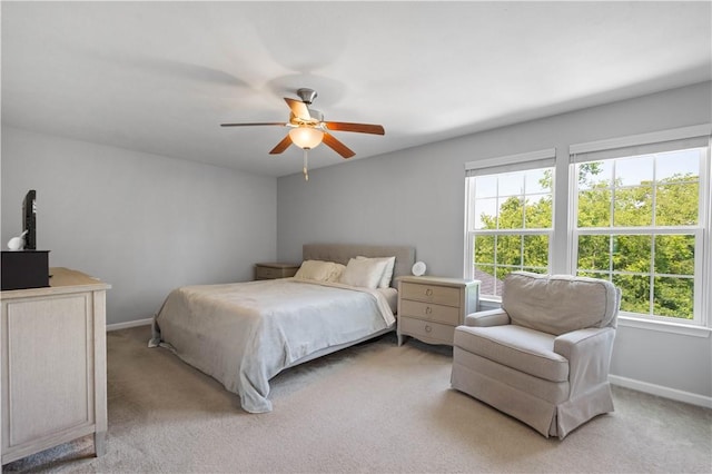 265 Sunrise Dr, Collier Twp, PA 15106 - bedroom with light colored carpet and ceiling fan