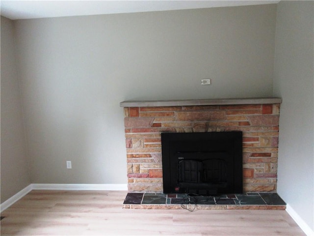 552 Heinz Camp Rd, Perry Twp Law, PA 16051 - detailed view of wood finished floors and a fireplace