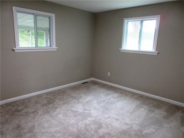 552 Heinz Camp Rd, Perry Twp Law, PA 16051 - empty room featuring healthy amount of natural light and carpet flooring