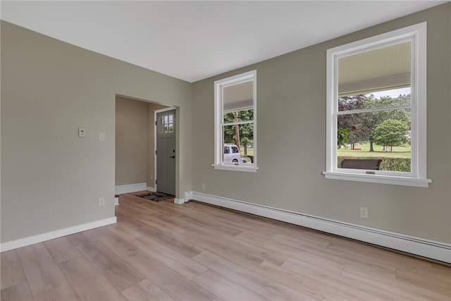 452 Canal St, Beaver, PA 15009 - unfurnished room with a baseboard radiator and light wood-type flooring