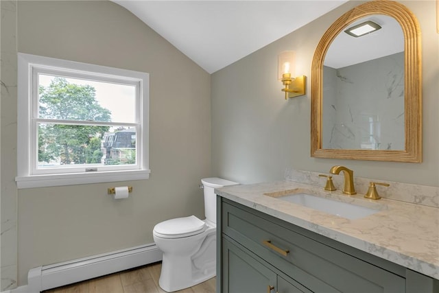 452 Canal St, Beaver, PA 15009 - bathroom featuring a baseboard radiator, vanity, lofted ceiling, and wood finished floors