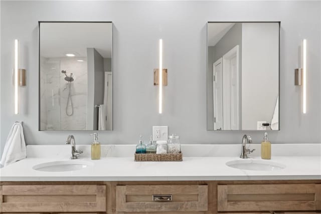 108 Ascot Ct, Lancaster Twp, PA 16037 - bathroom featuring double vanity and a marble finish shower