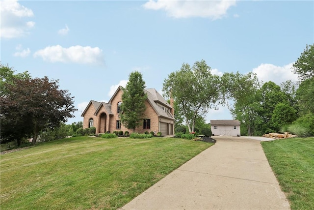 108 Ascot Ct, Lancaster Twp, PA 16037 - view of front of property featuring a garage, a front yard, brick siding, and concrete driveway