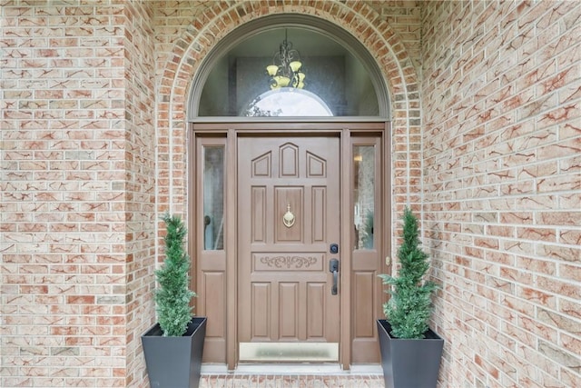 108 Ascot Ct, Lancaster Twp, PA 16037 - doorway to property featuring brick siding