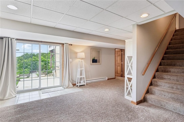108 Ascot Ct, Lancaster Twp, PA 16037 - staircase with a baseboard radiator, carpet flooring, a paneled ceiling, recessed lighting, and tile patterned flooring
