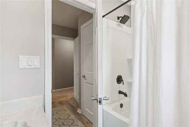 108 Ascot Ct, Lancaster Twp, PA 16037 - bathroom with shower / tub combo with curtain and wood finished floors