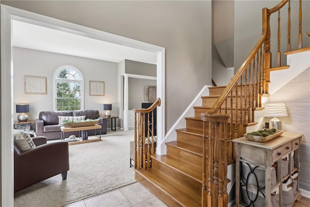 108 Ascot Ct, Lancaster Twp, PA 16037 - staircase featuring carpet floors and tile patterned flooring